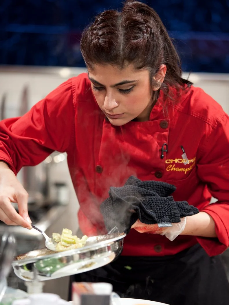 Chef Fatima Ali plates her dish, as seen on Food Network’s Chopped Champions, Season 14.
