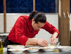 Chef Jun Tanaka plates his dish, as seen on Food Network’s Chopped Champions, Season 14.