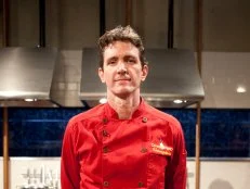 Chef Kris Wessel and basket, as seen on Food Network’s Chopped Champions, Season 14.

