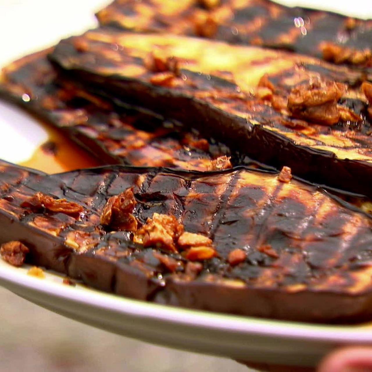 https://food.fnr.sndimg.com/content/dam/images/food/fullset/2012/2/13/0/BX0603H_grilled-eggplant-with-sherry-vinegar-drizzle_s4x3.jpg.rend.hgtvcom.1280.1280.suffix/1371603143118.jpeg