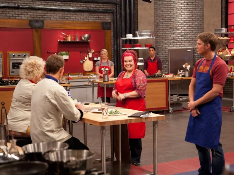 Chef Anne Burrell and Chef Bobby Flay taste meatball recipes inspired by the cuisine of Greece prepared by Red Team Recruit Dorothy Strouhal and Blue Team Recruit David Shelton for the "International Meatballs"  main dish challenge as seen on Food Network's Worst Cooks in America, Season 3.