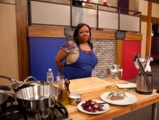 Blue Team Recruit Sherrill Moss-Solomon prepares a meatball recipe inspired by the cuisine of Sweden for the "International Meatballs"  main dish challenge as seen on Food Network's Worst Cooks in America, Season 3.