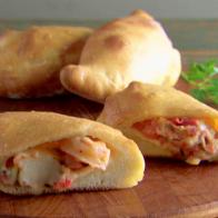 Calzones filled with cheese and meat mixture, prepared by Giada de Laurentiis. 