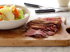 Food Network teaches you how to make corned beef at home for St. Patrick's Day.