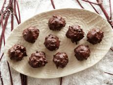 Get the recipe for Alton Brown's Chocolate Coconut Balls, part of Food Network's 12 Days of Cookies.