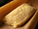 A corn tamale is served.