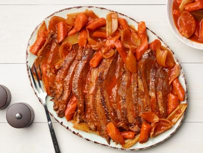 Ina Garten's Brisket With Carrots And Onions for the Friday Night Dinner episode of Barefoot Contessa, as seen on Food Network.