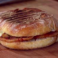 A breakfast panini is served.
