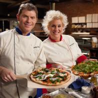 Team Leaders Chef Bobby Flay and Chef Anne Burrell demonstrate pizza making to both teams for the "Slice of Flavor" Skill Drill Challenge as seen on Food Network's Worst Cooks in America, Season 3.