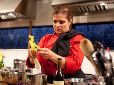 Chef Alex Guarnaschelli working on her appetizer as seen on Food Networks Chopped All Stars Tournament, Season 10 Ep10-12