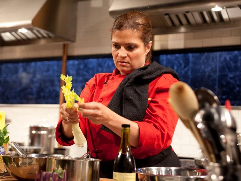 Chef Alex Guarnaschelli working on her appetizer as seen on Food Networks Chopped All Stars Tournament, Season 10 Ep10-12