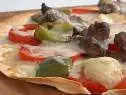 Tortilla Pizza prepared by Sandra Lee with leftover ingredients from her fridge. 