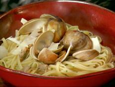 Linguine with White Clam Sauce is one of Anne Burrell's favorite "happy foods." Get this simple recipe from Secrets of a Restaurant Chef on Food Network.