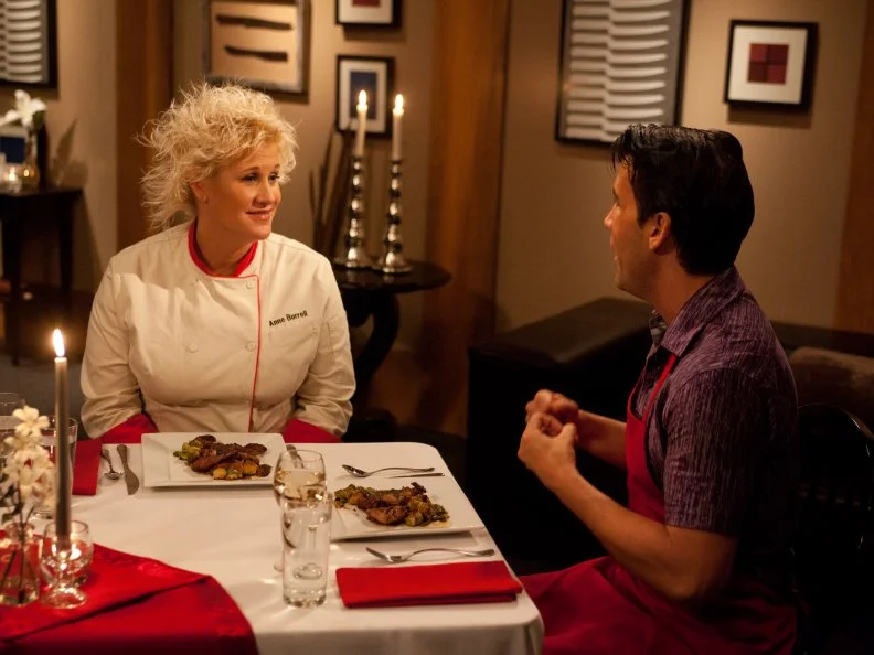 Worst Cooks In America Red Team Leader Chef Anne Burrell tastes Recruit Sean Bennett's Poussin al Mattone and  Sassy Sprouts for the Date Night Challenge as seen on Food Network's Worst Cooks in America, Season 3.
