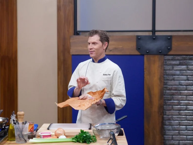 Worst Cooks In America Team Leader Chef Bobby Flay demonstrates how to prepare his Butterflied Squab with Piquillo Pepper Sauce to the Blue Team recruits for the  "Date Night" main dish challenge  as seen on Food Network's Worst Cooks in America, Season 3.