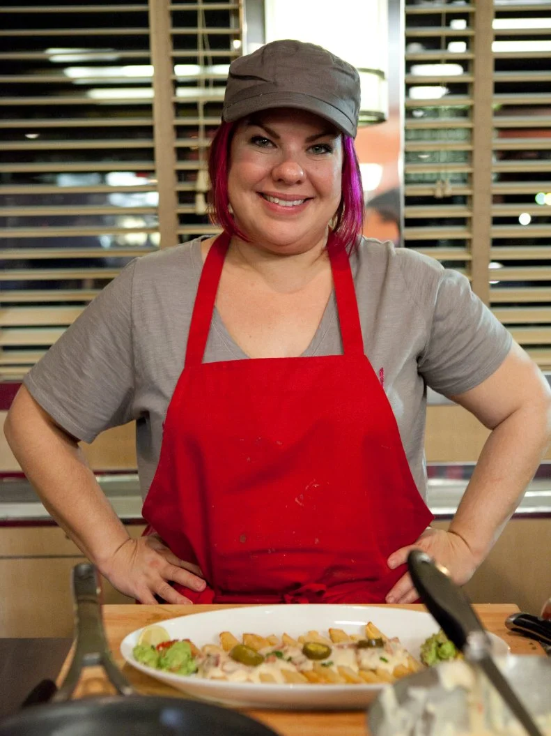 Dorothy Strouhal of the Red Team with her Late Night Fries after the Late Night Fries Challenge at the Tick-Tock Diner, as seen on Food Network’s Worst Cooks in America, Season 3.