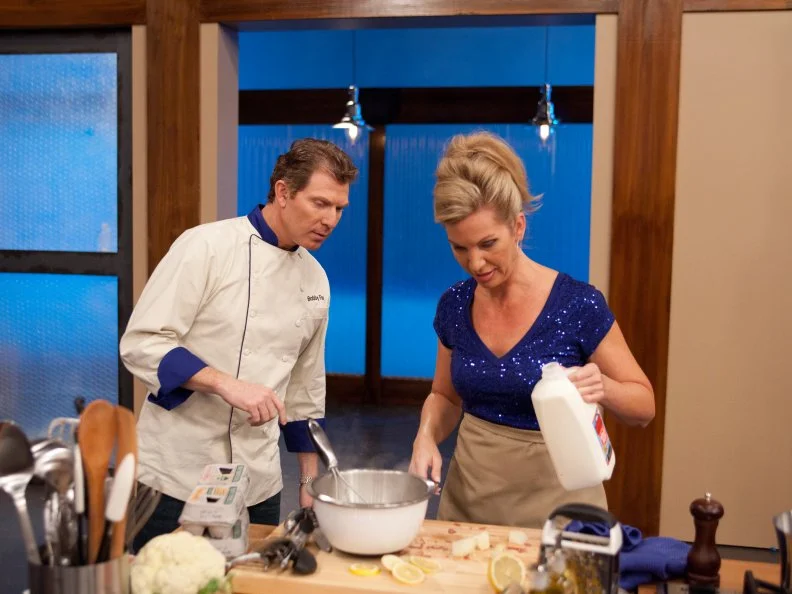 Worst Cooks in America Host Chef Bobby Flay checks in with recruit Libby Shelton Floyd as she prepares a favorite dish for the "Show Us Your Stuff"  challenge, as seen on Food Network's Worst Cooks in America, Season 3.