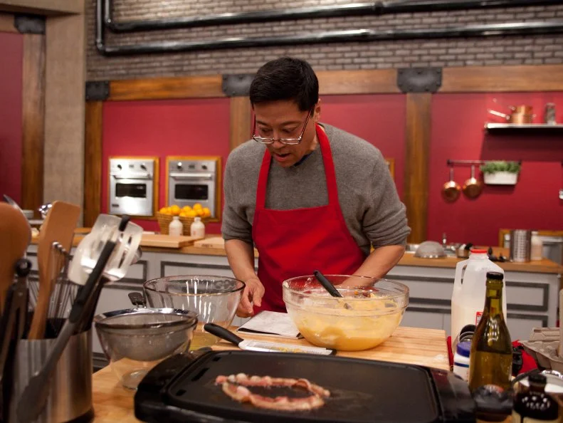 Worst Cooks In America Red Team Recruit Richard Chen prepares Pumpkin Orange Pancakes with Vanilla Whipped Cream and Cinnamon Maple Syrup and Thick Cut Bacon and eggs four ways for the "Back to Basics Breakfast Challenge" as seen on Food Network's Worst Cooks in America, Season 3.