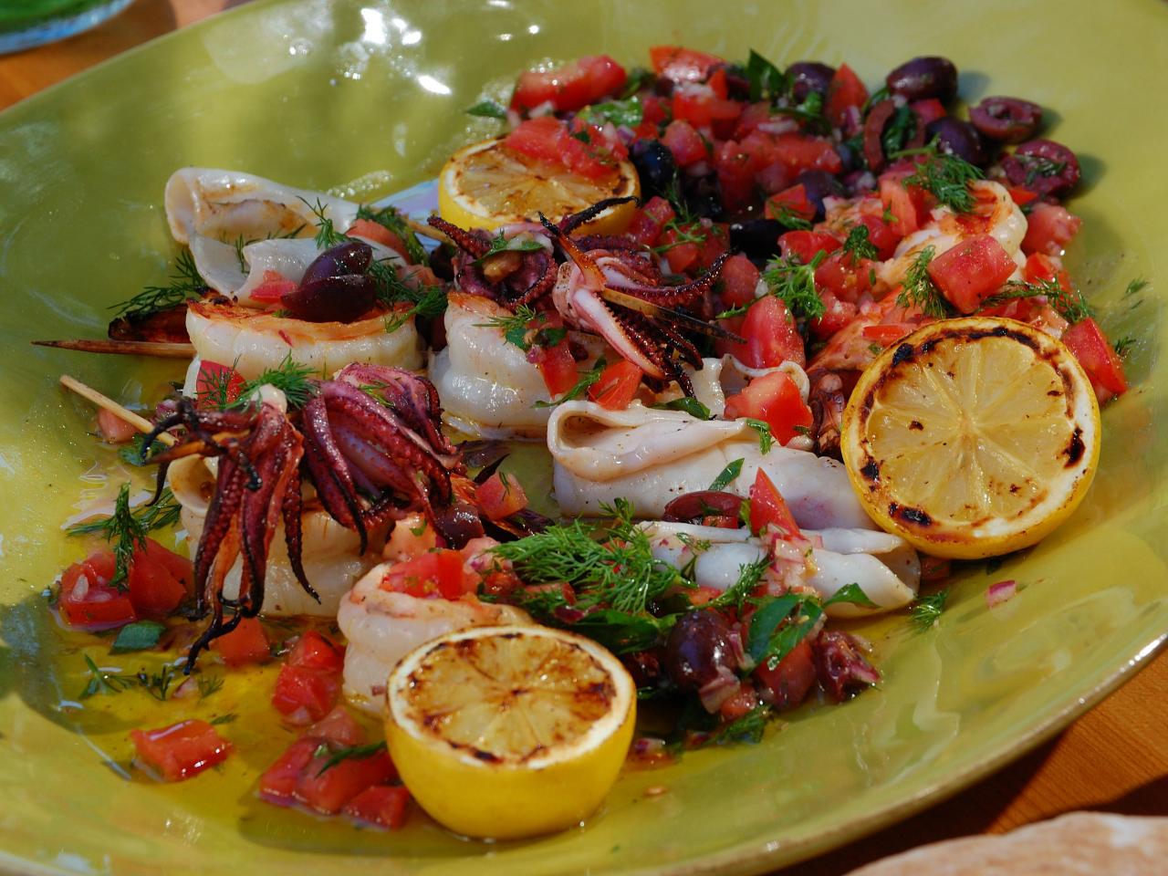 Charcoal Grilled Shrimp and Calamari with Grilled Lemons and Smoked Tomato Black Olive Relish