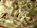 Broccoli stems, carrots and apples get together to make a delicious slaw.