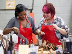 At the fish market, Wild Edibles, Dorothy Strouhal and Kelli Powers prepare lobster for a raw bar for the Everything Seafood challenge as seen on Food Network's Worst Cooks in America, Season 3.