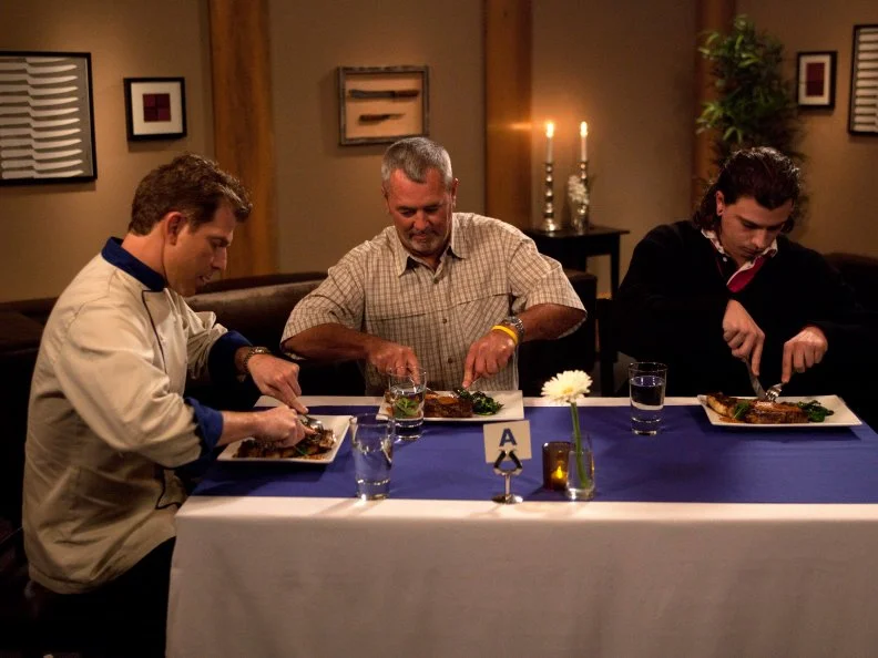 Blue Team Recruit Melissa Rhodes's fianace David Workinger and Vinnie Caligiuri's son Ryan Caligiuri sit down with Blue Team Leader Chef Bobby Flay to do a blind taste test of the meal Vinnie Caliuri prepared. They don't know which dish their loved one prepared, and they must judge each one. Vinnie prepared Sweet Ribeye and a side of Broccoli Rabe as part of the "Loved Ones" challenge as seen on Food Network's Worst Cooks in America, Season 3.