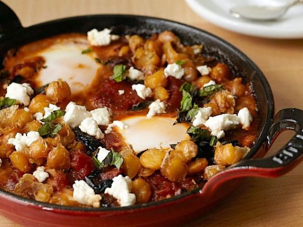 Harissa-Baked Eggs with Feta, Mint, and Black Olives