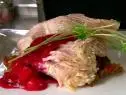 A plate of turkey confit is served.