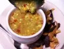 A ladle is used to pour gazpacho into a bowl at the Zia Diner in Santa Fe, NM.