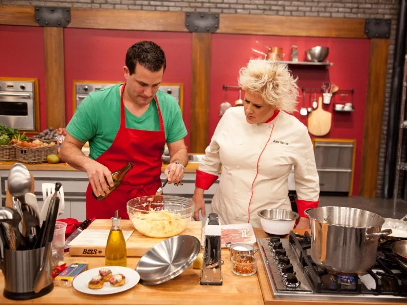 Worst Cooks in America Red Team Leader Chef Anne Burrell checks in with Recruit  Anthony Schiano as he prepares FDNY Pops potato skins and Boxty with Seared Lamb Loin and Creamy Whole Grain Mustard for the Potato Skin and Appetizers "St. Paddy's Day" challenge as seen on Food Network's Worst Cooks in America, Season 3.