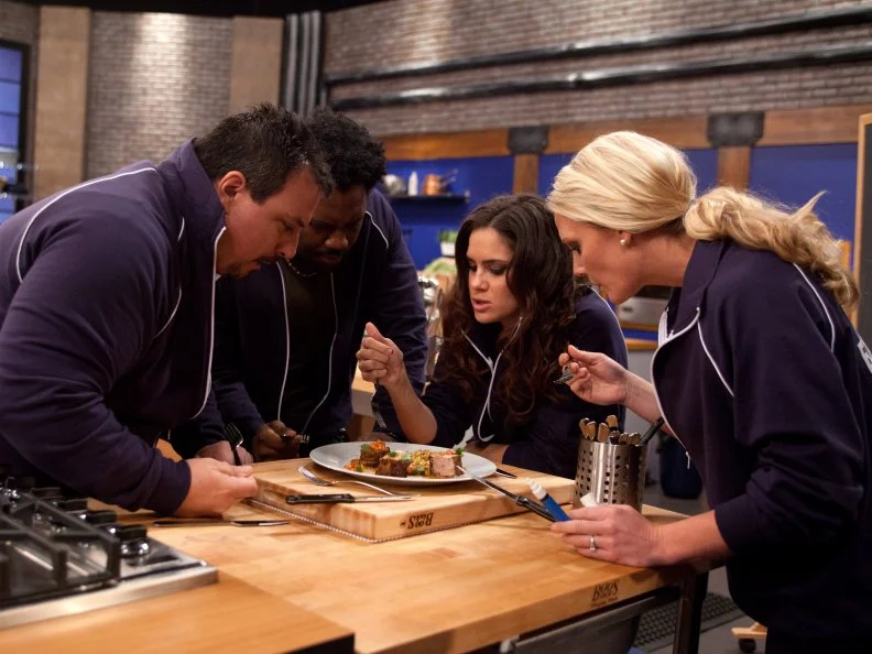 Worst Cooks In America Team Blue Team Recruits taste Chef Bobby Flay's Spice Rubbed Pork Tenderloin with Bourbon Chipotle Sauce, Grilled Corn and Papaya-Cilantro Relish without knowing the ingredients or the dish title for  the "Taste and Remake" challenge as seen on Food Network's Worst Cooks in America, Season 3.