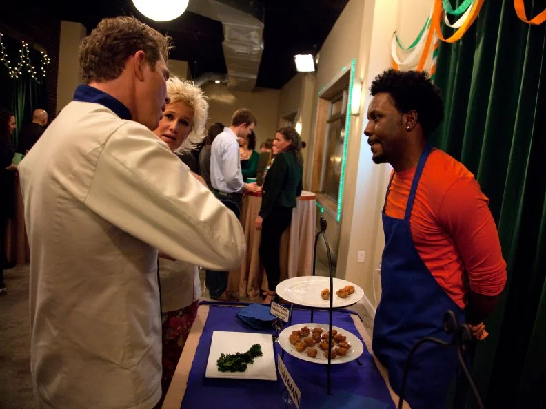 Worst Cooks in America  Blue Team Leader Chef Bobby Flay and Red Team Leader Chef Anne Burrell tastes  Recruit Benjamin Dennis's as he prepares Cheddar Chicken Apple potato skins and Crispy Potato Cake with Farmers Cheese, Scallion, Black Pepper and Kale Chips for the Potato Skin and Appetizers for the "St. Paddy's Day" challenge  as seen on Food Network's Worst Cooks in America, Season 3.