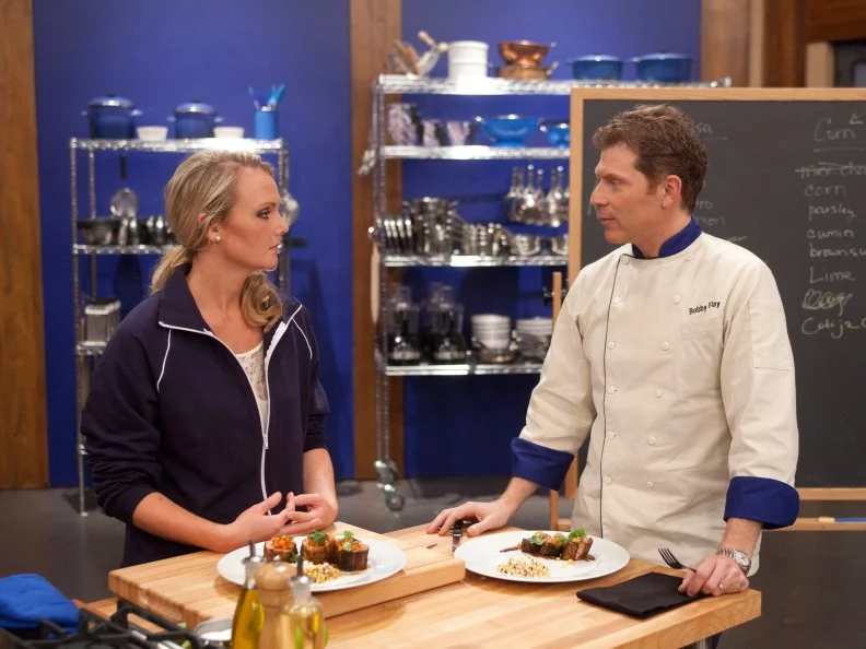 Worst Cooks In America Blue Team Leader Bobby Flay tastes Recruit Melissa Rhodes's grilled corn side dish.  It's her contribution to the Blue Teams interpretation  of Chef Bobby Flay's  Spice Rubbed Pork Tenderloin with Bourbon Chipotle Sauce, Grilled Corn and Papaya-Cilantro Relish for the"Taste and Remake" challenge as seen on Food Network's Worst Cooks in America, Season 3.