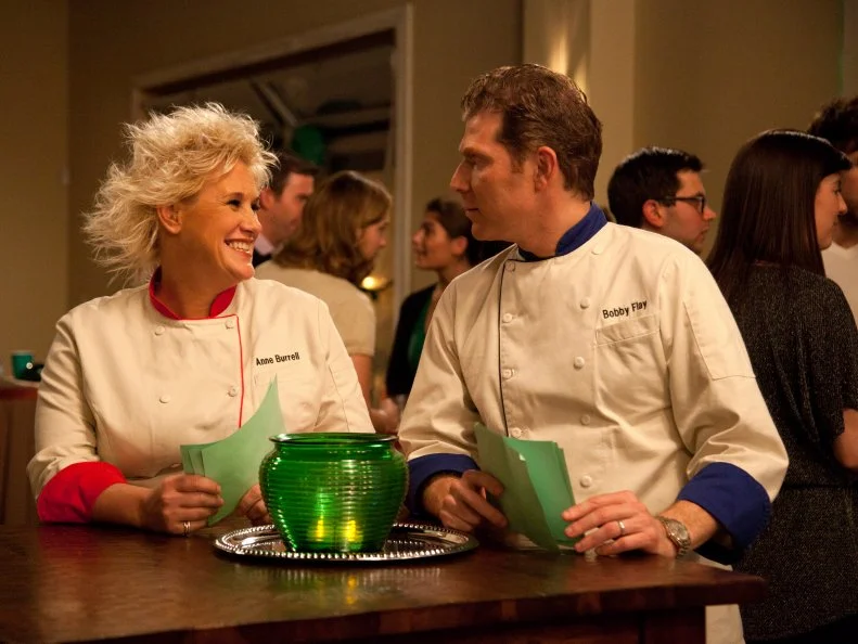 Worst Cooks in America Blue Team Leader Chef Bobby Flay and Red Team Leader Chef Anne Burrell review the party guest's reviews  at the St. Patricks Day party that's part of the Potato Skin and Appetizers "St. Paddy's Day" challenge as seen on Food Network's Worst Cooks in America, Season 3.