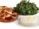 Potato and Kale Chips are served with dipping sauce.