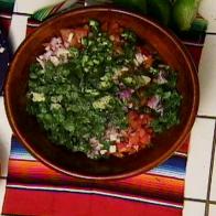 A bowl of Salsa Fresca is served.