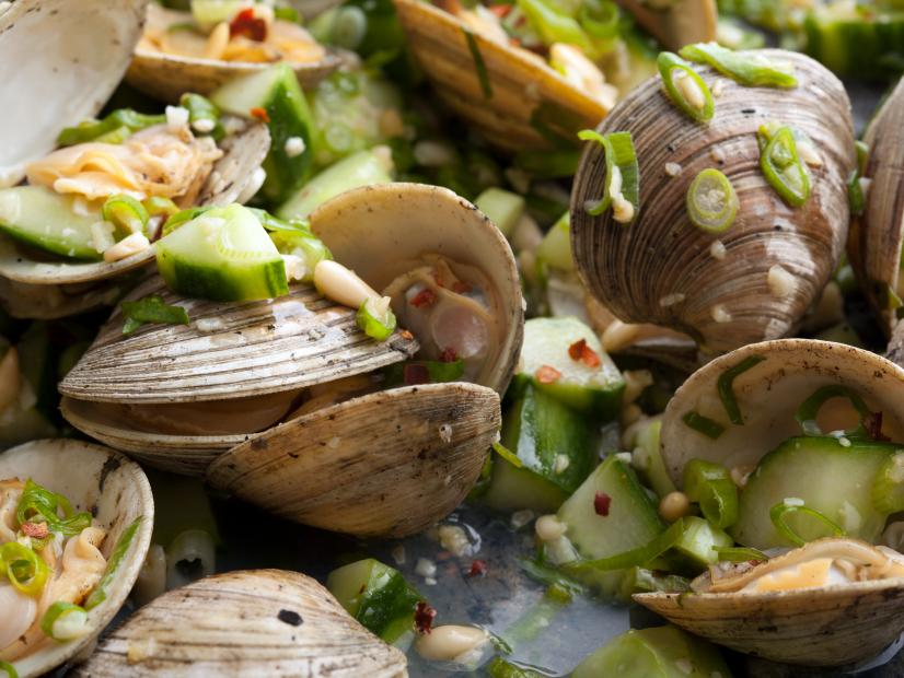 Grilled clams with scallions and cucumber