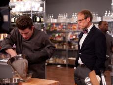 Producer Alton Brown checking in with Contestant Justin Warner cooking for the Star Challenge "Chopped Desserts" as seen on Food Network's Star Season 8, Episode 3