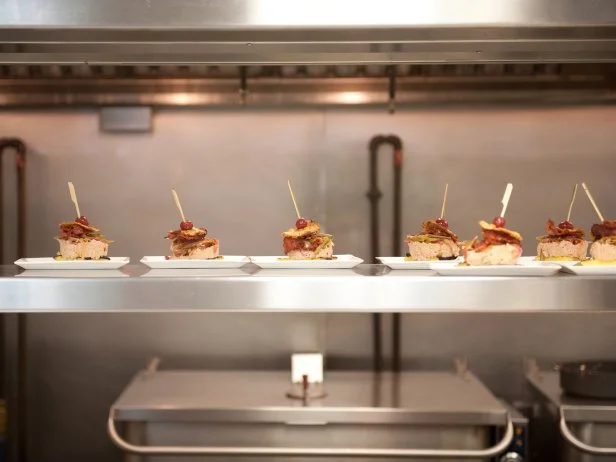 Contestant Emily Ellyn of Team Alton's dishes for the Star Challenge "Fashion Week: Taking a Risk" in Episode 4, as seen on Food Network's Star, Season 8.