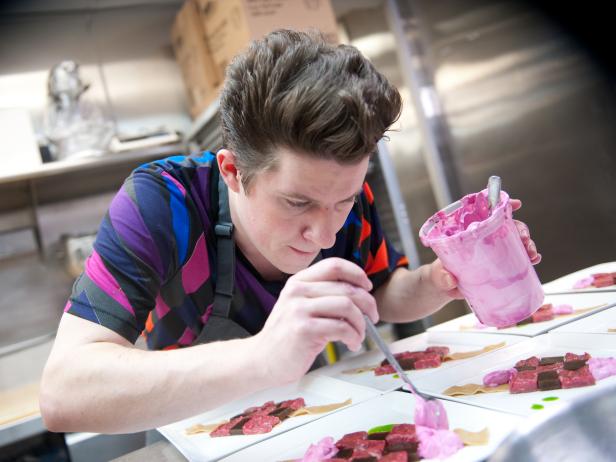 Contestant Justin Warner of Team Alton cooking for the Star Challenge "Fashion Week: Taking a Risk" in Episode 4, as seen on Food Network's Star, Season 8.