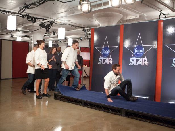 Contestants Martie Duncan, Judson Allen and Emily Ellyn of Team Alton watch Contestants Yvan Lemoine, Martita Jara, Josh Lyons and Philip Ippy Aiona of Team Giada giving their restaurant "Blu" presentation for their Star Challenge "Restaurant Impossible" as seen on Food Network's Star, Season 8.