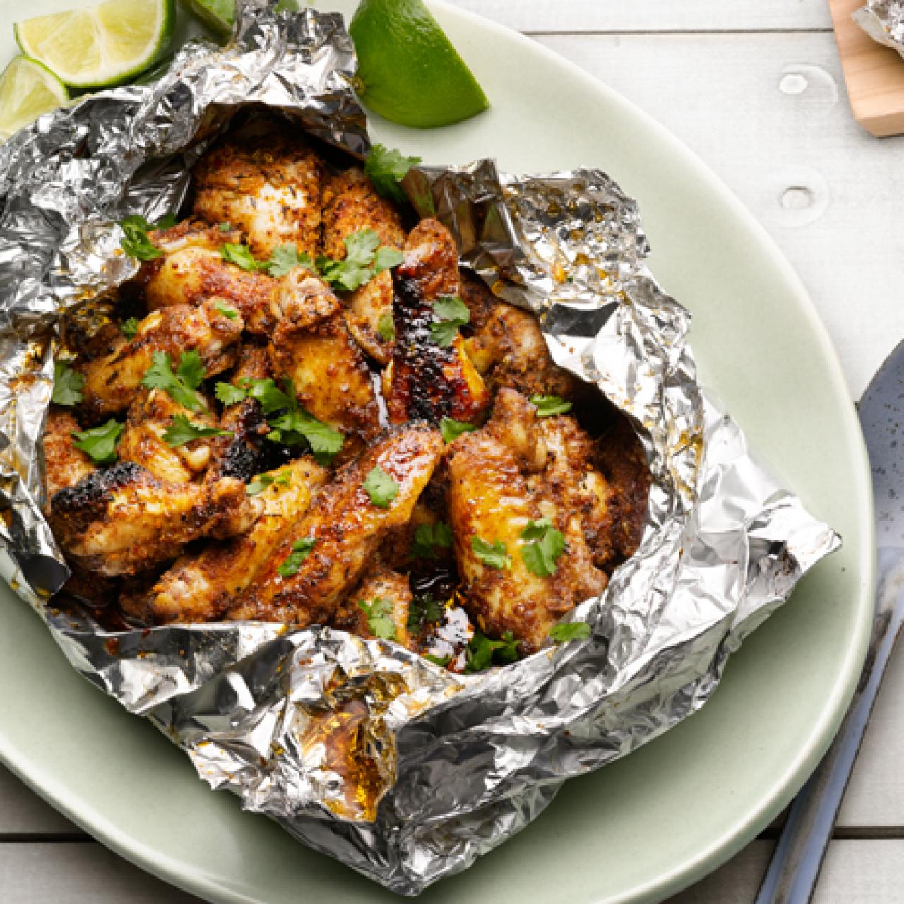 https://food.fnr.sndimg.com/content/dam/images/food/fullset/2012/5/4/0/FNM_060112-50-Things-to-Grill-in-Foil-Jerk-Chicken_s4x3.jpg.rend.hgtvcom.1280.1280.suffix/1371607356735.jpeg