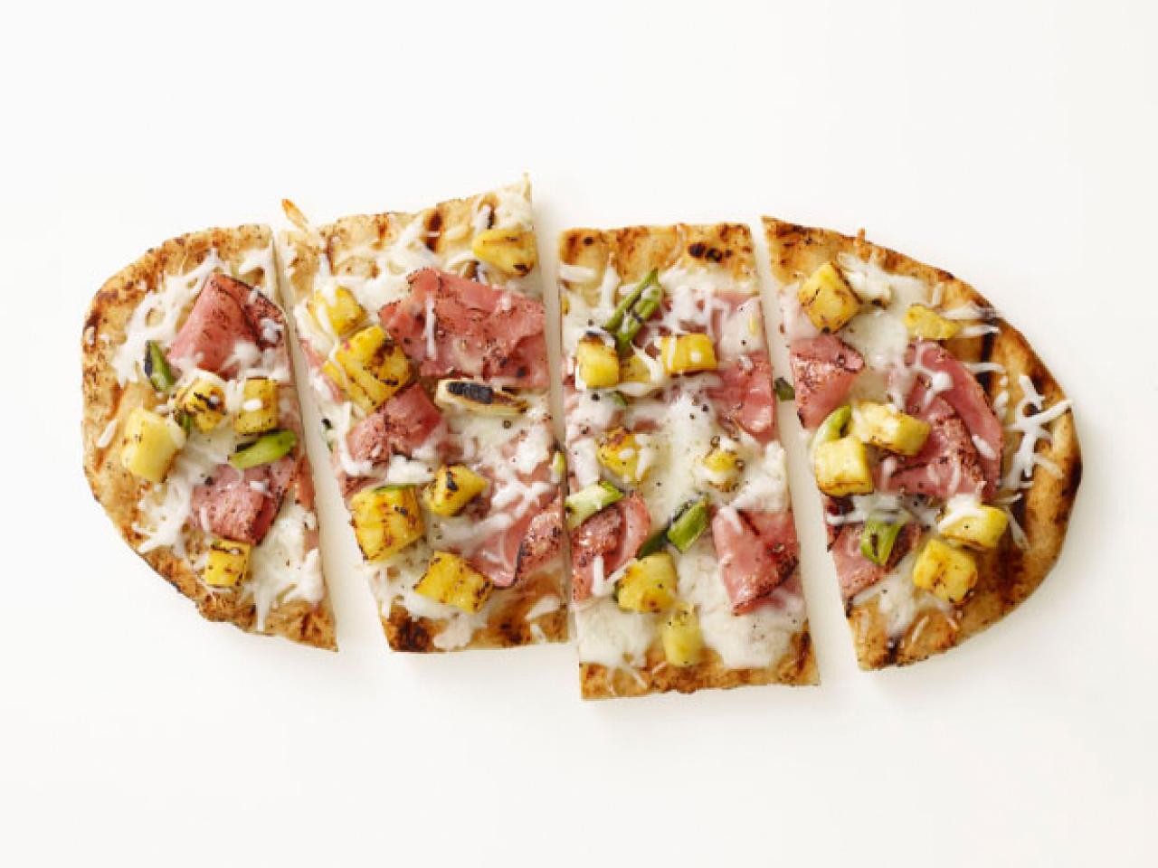 https://food.fnr.sndimg.com/content/dam/images/food/fullset/2012/6/1/4/FNM_070112-Grilled-Hawaiian-Pizza-Recipe_s4x3.jpg.rend.hgtvcom.1280.960.suffix/1382541469180.jpeg