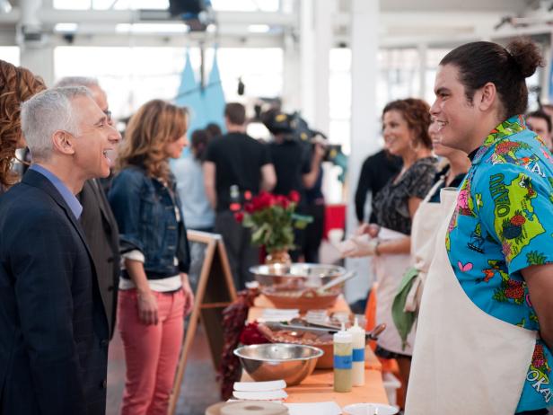 Contestants Martita Jara, Linkie Marais and Phillip "ippy" Aiona of Team Giada serving their dishes from their kiosk "Besa Me" to Star Producer Giada De Laurentiis, The Network's Susie Fogelson and Bob Tuschman and Guest Star Iron Chef Geoffrey Zakarian at the Star Challenge "Themed Food Court Kiosk-Mexican" as seen on Food Network's Star, Season 8.