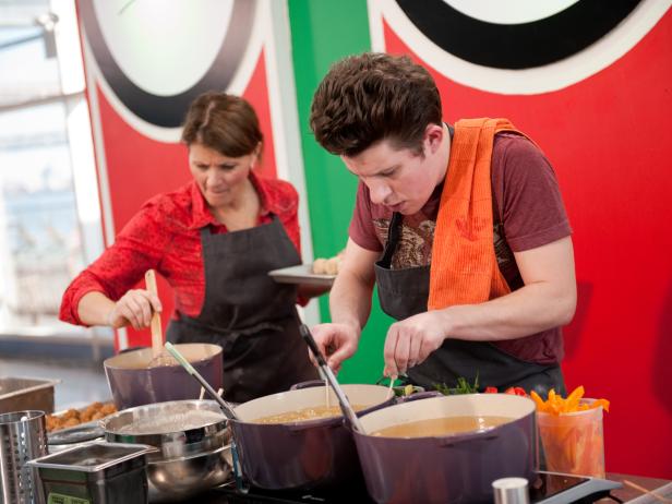 Contestants Martie Duncan and Justin Warner of Team Alton serving their dishes for their kiosk "Littler Italy" at the Star Challenge "Themed Food Court Kiosk-Italian" as seen on Food Network's Star, Season 8.