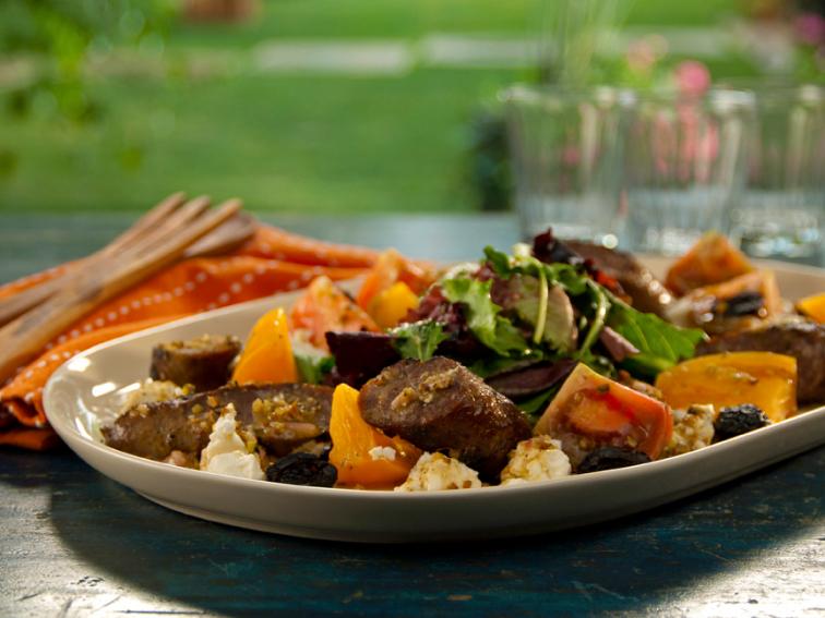 Grilled Lamb Sausage with Goat Cheese, Heirloom Tomatoes, Olives and