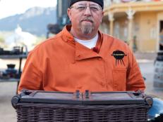 Chef Tommy Duncan with the first round's mystery basket,  during day one of the Chopped $50K Grilling Challenge in Tucson AZ,  as seen on Food Network's Chopped Season 12.