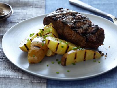 Food Network Kitchens Whiskey Glazed Flat Iron Steaks and Grilled Potatoes