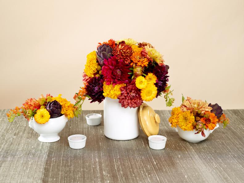 Use kitchen tools like soup bowls and a cookie jar for your flower arrangements