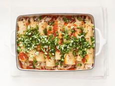 Check out Food Network's top five chicken enchilada recipes, each a flavor-packed recipe that will wow the crowd at your weekend tailgate or big game bash.